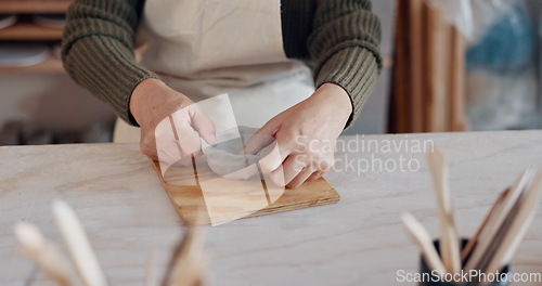 Image of Clay bowl, woman hands and sculpture in artist studio, workshop and small business of creative product, craft and pottery. Ceramic designer, artisan and creation class, mold form and handmade process