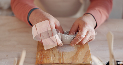 Image of Pottery, clay bowl and craftsman hands in artist studio, workshop and small business of creative product manufacturing. Ceramic designer, artisan and sculpture skill, mold shape and handmade process