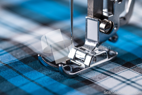 Image of Sewing machine and fabric