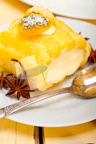 Image of cream roll cake dessert and spices