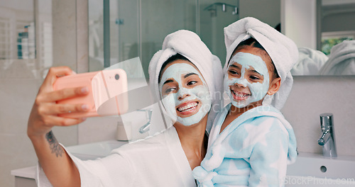 Image of Selfie, facial and family with a mother and daughter in the bathroom of their home together. Children, love and photograph with a woman and girl kid posing for a picture while bonding in the house