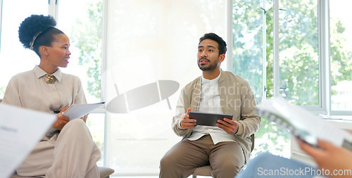 Image of Businessman, talking or answer hands in diversity workshop, training or feedback on tablet or paper. Collaboration, teamwork or strategy planning question for mentor with technology in review meeting