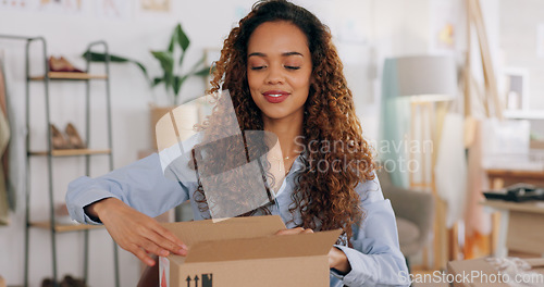 Image of E commerce, delivery and employee packaging box, product or stock for commercial distribution, courier shipping or export. Ecommerce, retail package and black woman working in supply chain industr