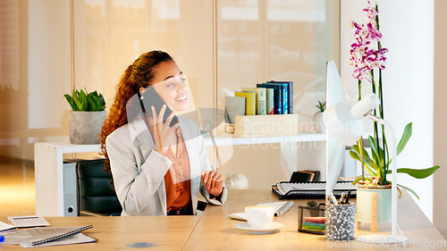 Image of Human resource manager talking on a call with employee explaining a strategy or contract. Female hr assistant scheduling an interview or meeting with a client while sitting at computer desk inside