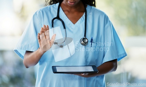 Image of Healthcare, tablet and doctor with stethoscope in hospital checking results after a consultation. Medical, technology and African female nurse with a mobile device for research in a medicare clinic.