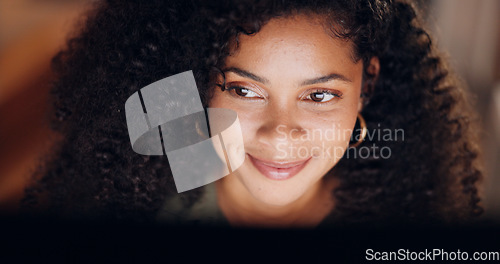 Image of Happy, night office and business woman with a computer working overtime on a project in modern workplace. Corporate, professional and manager from Mexico planning a company strategy report with smile