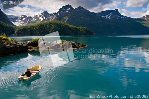 Image of Small boat on fjord