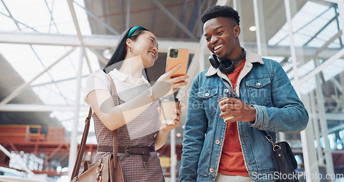 Image of Shopping mall, smartphone and couple of friends on social media, website or blog for discount, sales and travel communication. Diversity gen z people walking, using phone or cellphone and coffee cup