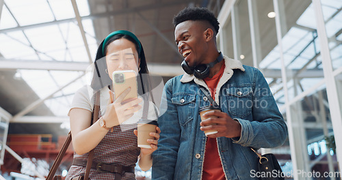 Image of Shopping mall, smartphone and couple of friends on social media, website or blog for discount, sales and travel communication. Diversity gen z people walking, using phone or cellphone and coffee cup