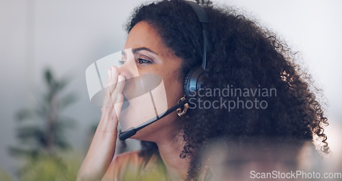 Image of Customer service, tired and woman yawning in call center office on night shift. Fatigue, working late and face of black woman, consultant and female sales agent yawn while telemarketing in workplace