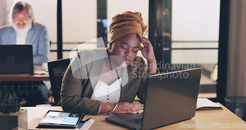 Image of Business, stress and black woman in office, night and overworked. African American female, employee and administrator with depression, tired and burnout for deadline, online schedule and anxiety.