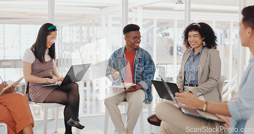 Image of Business people, startup meeting or brainstorming in office for diversity, planning or teamwork strategy. Digital marketing team, laptop and discussion with group, think tank or conversation for idea