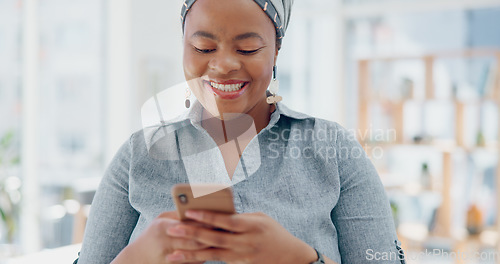 Image of Creative black woman, phone and smile for social media, texting or chatting in communication or office startup. Happy African American woman employee smiling for online conversation on smartphone