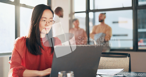 Image of Business, technology and Asian woman in office, working with team on laptop, tablet and computer in workplace. Success, teamwork and female worker walking, meeting and planning for digital marketing