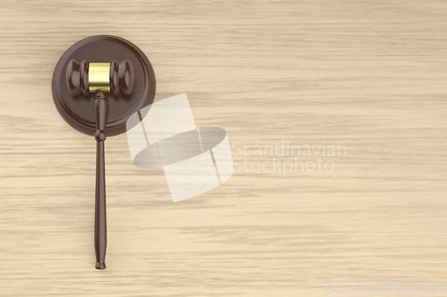 Image of Wooden gavel on the wooden desk