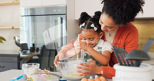 Image of Cooking, kitchen and mother with child teaching, learning and working together for breakfast, cake or cookies in home development. Family mom and kid baking dessert with food, eggs, butter and flour