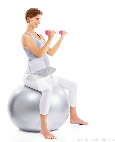 Image of Fitness, exercise and pregnant woman weightlifting on ball for maternal wellness, healthy lifestyle and wellbeing. Sports, pregnancy and girl in workout, training and pilates with dumbbells in studio