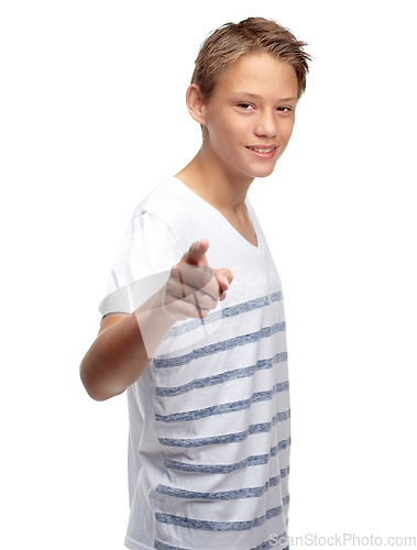 Image of Children, portrait and pointing with a boy in studio isolated on a white background for branding or marketing. Kids, hand and point with a male child on blank mockup space for advertising a logo