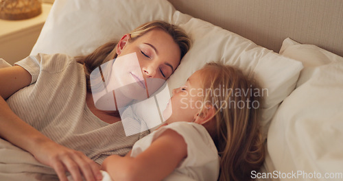 Image of Bed, mom and child relax sleep together in bed, calm and peace in bedroom at night in home. Tired young mother, kid girl sleeping and childhood support, trust and care in safe peaceful family house