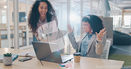 Image of Teamwork, laptop and business people fist bump, applause and success celebration. Coaching, training and friends, women or coworkers, clapping and celebrate after solving problem in office workplace.