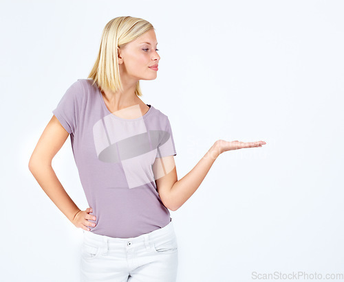 Image of Woman, showing and hand for marketing space, advertising mock up and product placement mockup on studio background. Model, hand gesture and promotion for sales deal, logo branding and about us design