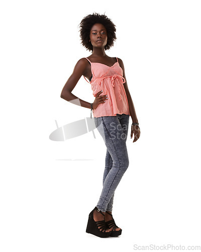 Image of Fashion, stylish and portrait of a black woman with confidence on a white background in studio. Trendy, fashionable and clothing of a young African model with an elegant pose and attitude in Nigeria