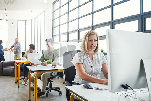 Image of Business, office building and woman with computer working on online email, website research and project. Productivity, corporate agency and female worker at desk for planning, schedule and strategy