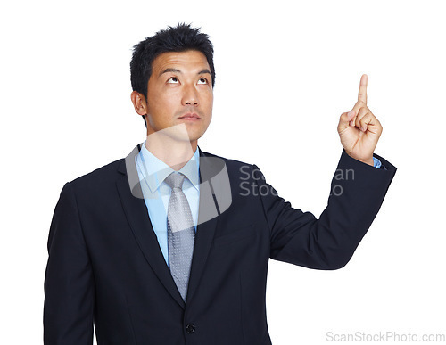 Image of Studio, pointing and Asian business man with gesture for professional mockup space, advertising or marketing. Promotion mock up, corporate branding and Japanese model isolated on white background