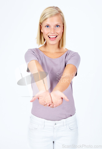 Image of Portrait, product and open hands with a model woman in studio isolated on a white background for marketing. Hands, advertising and brand with a female posing on blank branding space for a logo