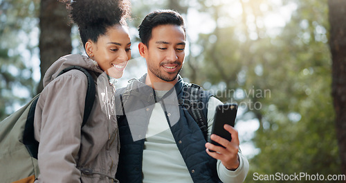 Image of Couple, hiking and selfie, outdoor and travel, black woman and man together out in nature with technology and backpacking in woods. Hiker on adventure, relationship and photo with smartphone.