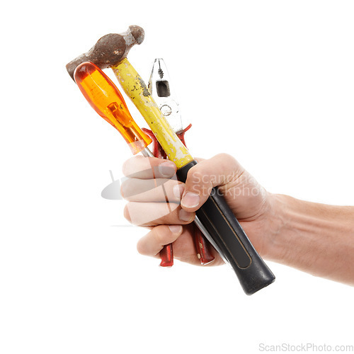 Image of Handyman, industry and hand with tools in studio for repairs, maintenance or building. Industry, repairman and male industrial worker with hammer, screwdriver and pliers isolated by white background.