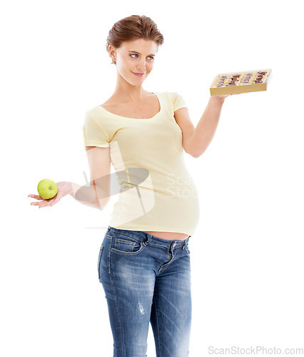 Image of Pregnant, thinking and diet of woman with candy craving, choice and temptation marketing mockup. Pregnancy belly of girl choosing sweets with contemplating smile and white studio advertising.