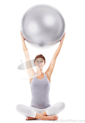 Image of Pregnant woman, smile and exercise ball with white background for fitness, pilates and wellness. Pregnancy, medicine ball and workout in studio for healthy maternity, yoga training and body energy