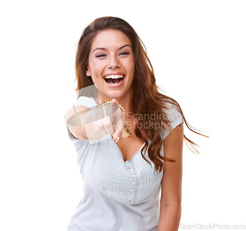 Image of Laugh, bullying and woman pointing in studio on white background for humor, shame and mocking. Hand gesture, mean and portrait of girl point finger for attitude, making fun and laughing at joke