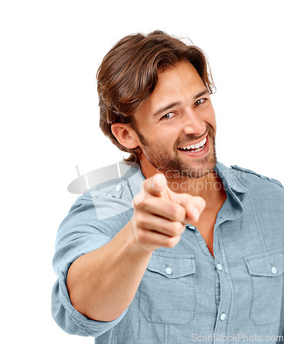 Image of White background, smile and portrait of man pointing in studio for motivation, choice and encouragement in studio. Marketing, advertising and mockup of male with hand gesture, point finger and sign