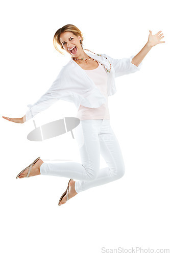 Image of Woman, excited and jumping happy in studio for freedom, positive mindset energy and isolated in white background. Female, smile and jump in air for happiness motivation, celebration or winner success