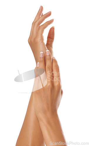 Image of Manicure, beauty and hands of an elegant woman on a white background in studio. Skincare, dermatology treatment and zoom on model nails for cosmetics, wellness and feminine cosmetic skin care