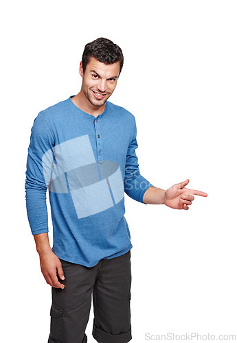 Image of Handsome, young and portrait of a man in a studio pointing for mockup space for advertising or marketing. Happy, smile and male model from Canada with a casual outfit isolated by a white background.
