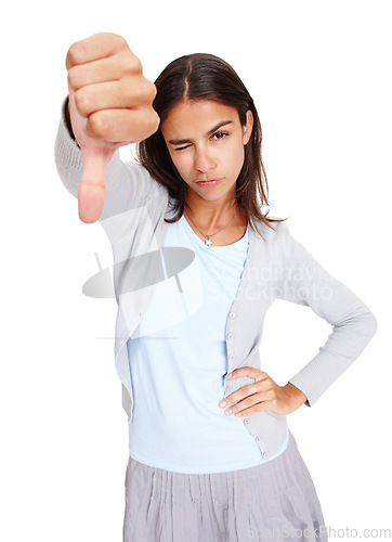 Image of Young woman, hand and thumbs down with wink in disappointment, fail or wrong against a white studio background. Portrait of isolated female showing down thumb to disagree, incorrect or negative