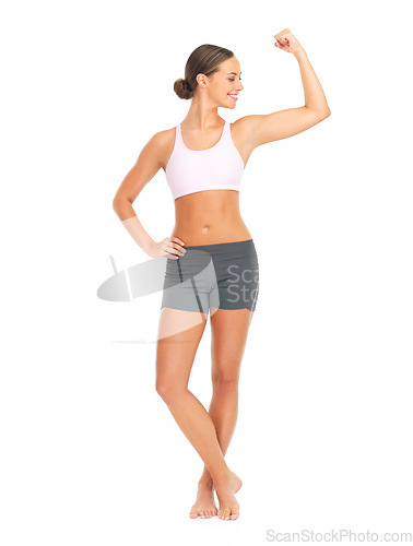 Image of Sports, fitness and woman with arm muscle in studio isolated on a white background mockup. Strong, power and female model, athlete or body builder flexing bicep after training, workout or exercise