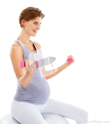 Image of Woman, pregnancy and exercise ball with dumbbell in studio for fitness, wellness and self care by white background. Pregnant woman, development and isolated workout for future, health and training