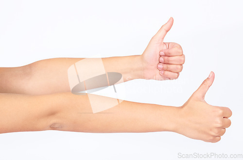 Image of Thumbs up, success and hands of people for thank you, agreement and like on white background in studio. Winning motivation, yes and emoji hand for yes, happy sign and approval on a studio background