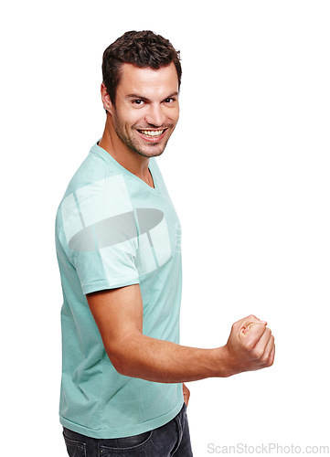 Image of Portrait, man and fist for success, winning and young guy isolated on white studio background. Male, gentleman and winner with gesture, achievement and victory with smile, celebrate and on backdrop