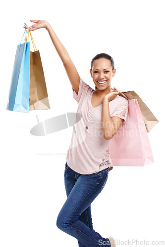 Image of Shopping bags, fashion and portrait of woman in studio isolated on a white background. Black Friday discount, sales deals and happy female customer holding gifts after buying at mall, store or shop.