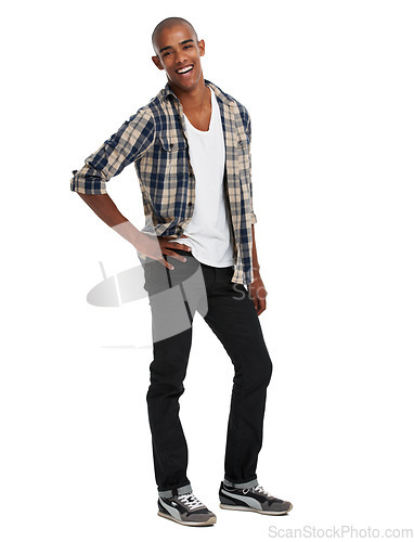 Image of Portrait, body language and confidence with a black man in studio on a white background to promote trendy clothes. Happy, smile and natural with a casual male posing in casual or contemorary clothing