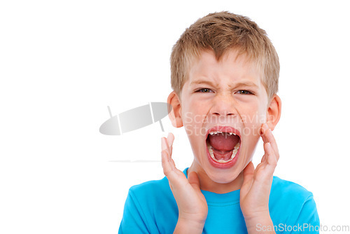 Image of Frustrated kid, studio portrait and shouting with anger facial expression by white background for mental health. Boy child, crying and isolated with frustrated emotion, adhd and autism in childhood