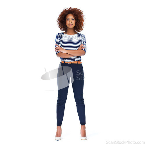 Image of Portrait, arms crossed and black woman standing on white background, studio or isolated pose. Female model, trendy fashion and casual outfit style with afro, motivation and confidence for empowerment