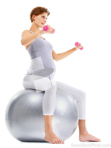 Image of Fitness, weightlifting and pregnant woman on gym ball for maternity wellness, healthy lifestyle and wellbeing. Sports, pregnancy and female for workout, exercise and pilates with dumbbells in studio