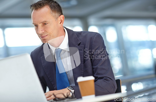 Image of Thinking, planning or accountant man with laptop for invest strategy, finance growth or financial review. Analytics or manager in office building for trading, data analysis or economy data research