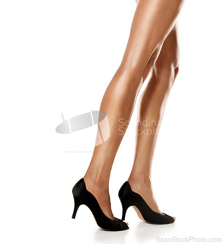 Image of Woman, high heels and legs for beauty on studio, isolated white background and body care. Closeup, sexy shoes and leg model for skincare, hair removal and erotic fashion aesthetic and sensual feet